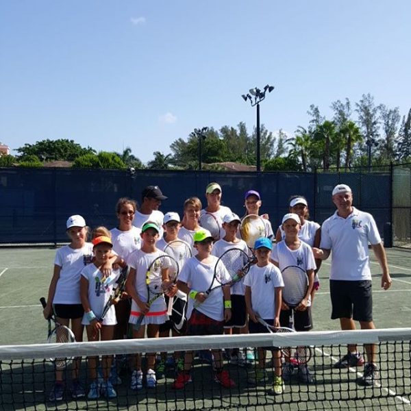 Tennis School group picture with coach