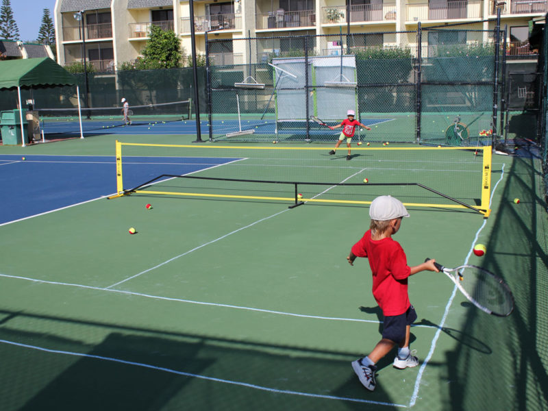 Tennis Training kids playing with each other