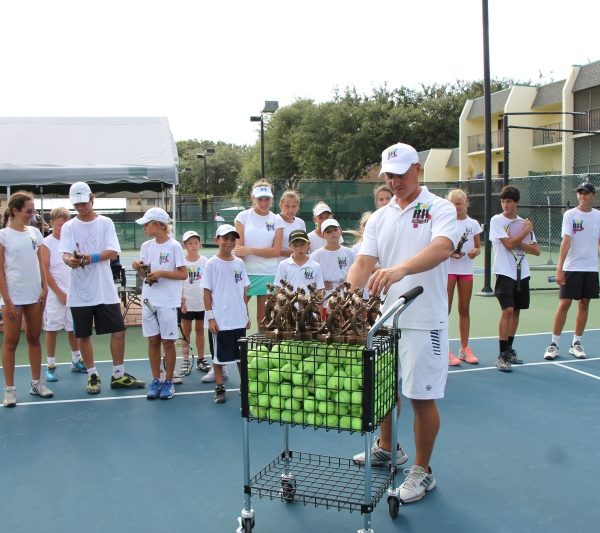 Tennis Training players with coach