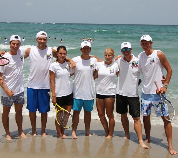 Tennis Tution players on beach